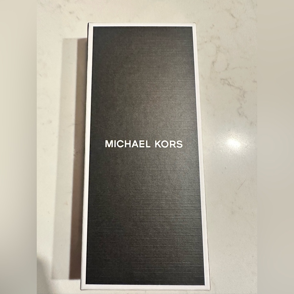 NWB- Michael Kors AirTag holder in blue. Pair of two